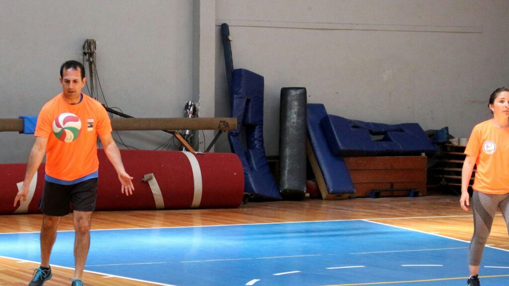 Two Athletes Training on Indoor Gym Court Desktop Wallpaper