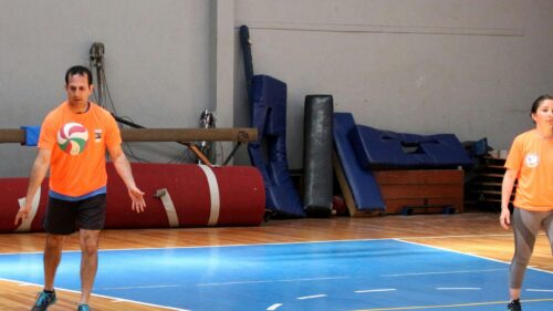 Two Athletes Training on Indoor Gym Court Desktop Wallpaper