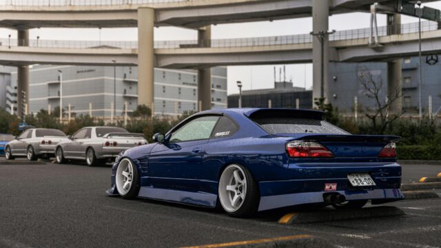 Modified Blue Nissan Silvia S15 JDM Car in Rainy Parking Lot 4K Wallpaper