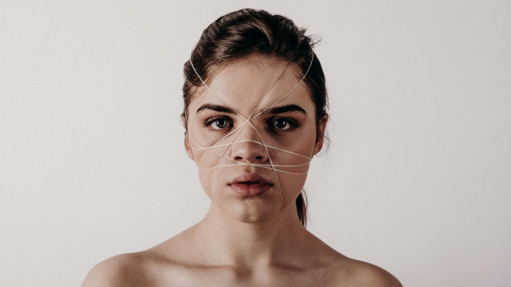 Woman With String Wrapped Around Face Artistic 4K Desktop Wallpaper