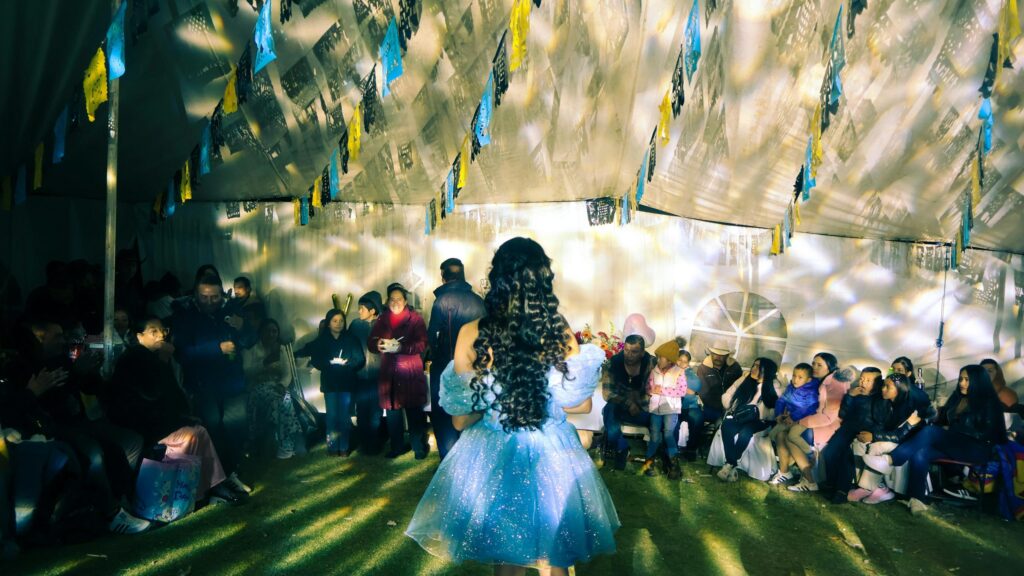 Enchanting Quinceañera Celebration in Blue Gown Desktop Wallpaper