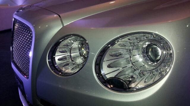 Close-up Luxury Bentley Continental Silver Car Headlight 4K Wallpaper