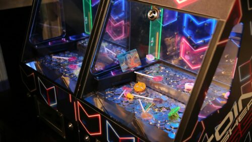 Neon Coin Pusher Arcade Game Machine 4K Desktop Wallpaper