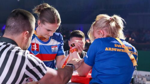 Intense Professional Arm Wrestling Match Desktop Wallpaper