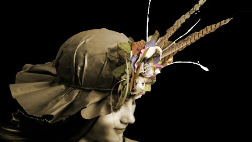 Vintage Style Girl with Feathered Floral Hat 4K Desktop Wallpaper