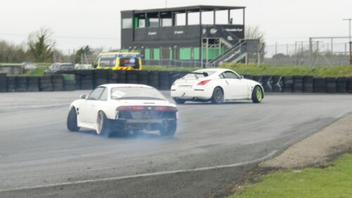 Drifting White Nissan JDM Sports Cars on Track 4K Desktop Wallpaper