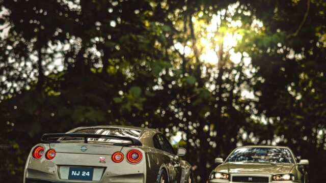 Nissan Skyline GT-R R34 and R35 Golden Hour Duo Desktop Wallpaper