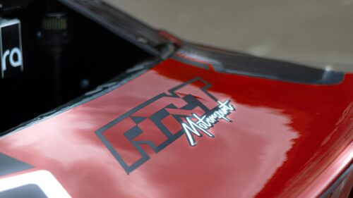 Red Racing Car Hood with FTN Motorsport Logo 4K Wallpaper