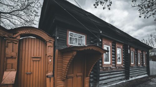 Rustic Wooden House with Traditional Russian Architecture Desktop Wallpaper