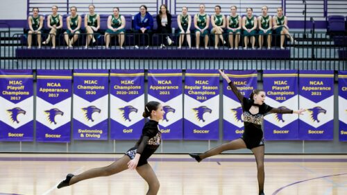 Two Dancers Performing Dynamic Choreography on Court Desktop Wallpaper