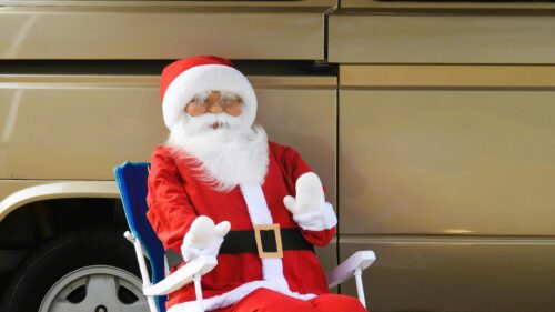 Santa Claus Resting on a Camping Chair 4K Desktop Wallpaper