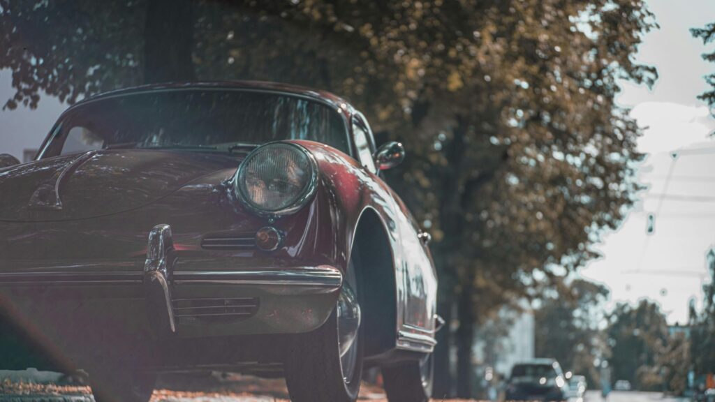Vintage Maroon Porsche 356 Parked Under Autumn Trees 4K Wallpaper