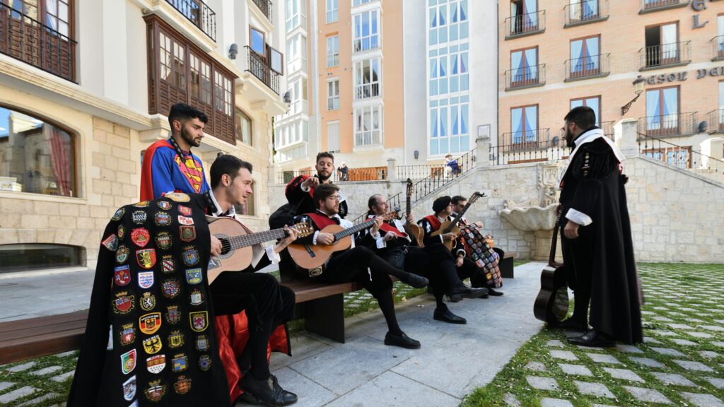 Spanish Tuna Musicians in Traditional Folk Costumes Desktop Wallpaper