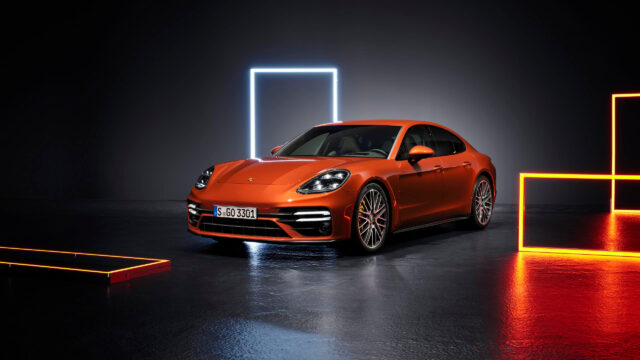 Stunning Orange Porsche Panamera with Neon Lights Desktop Wallpaper