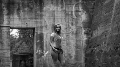 Stunning Woman Standing Before Concrete Ruins Monochrome Desktop Wallpaper