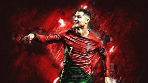 Cristiano Ronaldo Smiling in Portugal Kit Red Grunge Background 4K Wallpaper