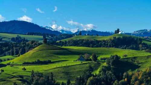 Stunning Swiss Alps Green Rolling Hills Landscape Desktop Wallpaper