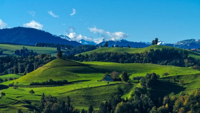Stunning Swiss Alps Green Rolling Hills Landscape Desktop Wallpaper