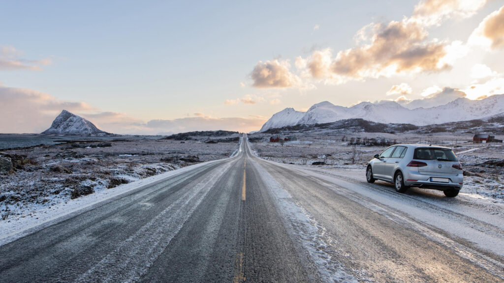 Stunning Norwegian Winter Road Trip with Silver Volkswagen Golf Desktop Wallpaper