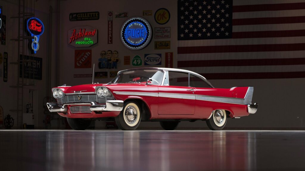 Classic 1958 Plymouth Fury Red Coupe in Vintage Garage Desktop Wallpaper