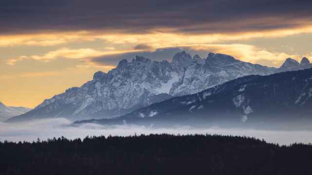 Majestic Snow-Capped Alpine Mountain Peaks at Golden Sunset 4K Wallpaper