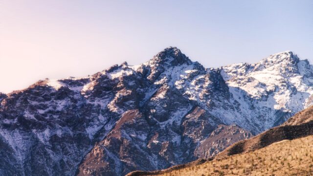 Majestic Snowy Mountain Peaks at Sunset Landscape 4K Desktop Wallpaper