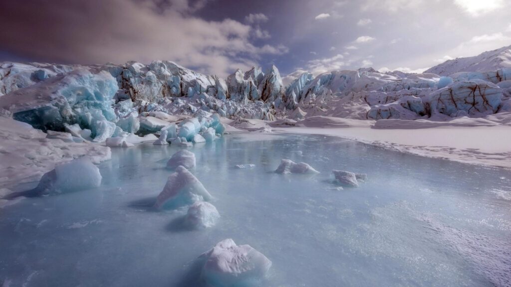 Breathtaking Glacial Ice Landscape with Frozen Lake 4K Desktop Wallpaper