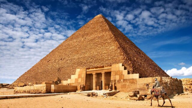 Majestic Great Pyramid of Giza with Camel Rider Desktop Wallpaper