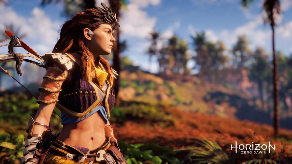 Aloy from Horizon Zero Dawn Standing in a Lush Landscape PC Wallpaper