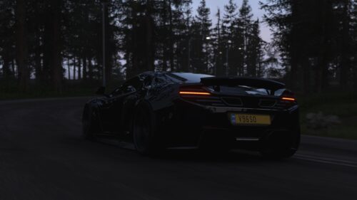 Black McLaren Sports Car Driving Through Dark Forest Night Desktop Wallpaper