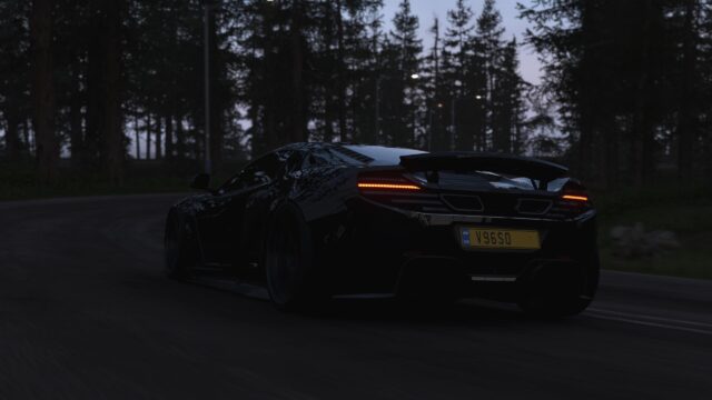 Black McLaren Sports Car Driving Through Dark Forest Night Desktop Wallpaper
