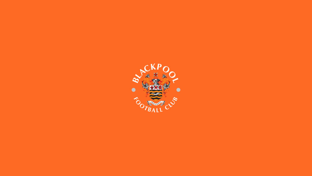 Blackpool Football Club Logo on Vibrant Orange Background Desktop Wallpaper