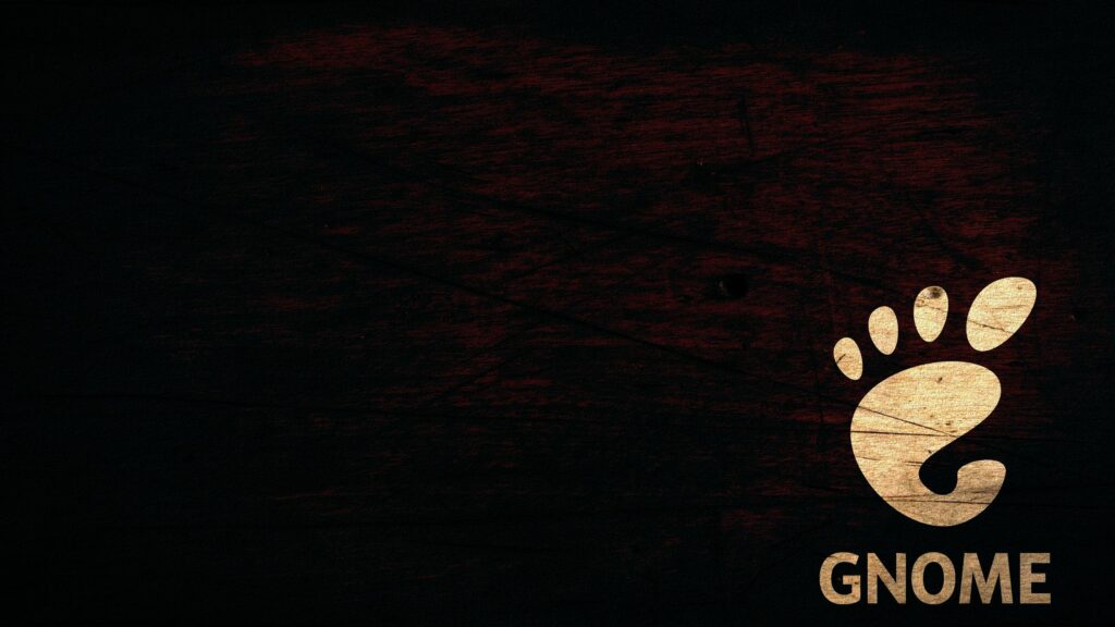 Minimalist GNOME Logo on Dark Wooden Texture Desktop Wallpaper