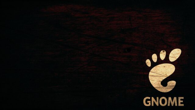 Minimalist GNOME Logo on Dark Wooden Texture Desktop Wallpaper