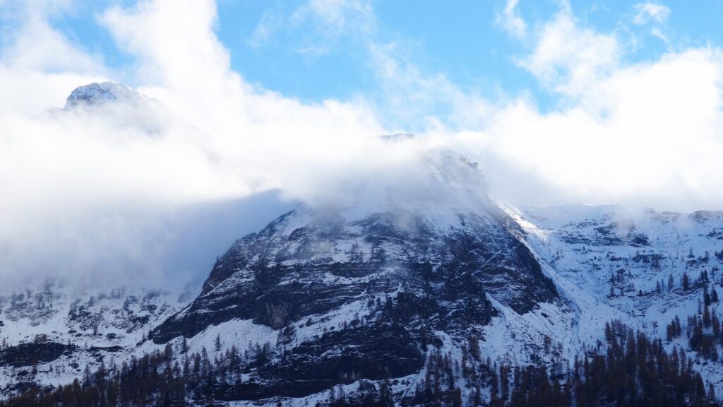 Majestic Snow Covered Mountain Peaks Under Blue Sky Desktop Wallpaper