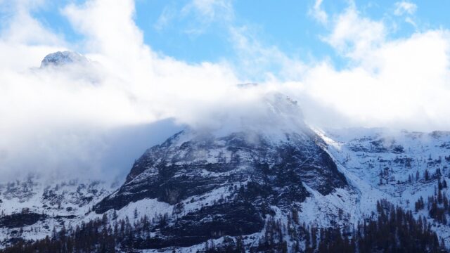 Majestic Snow Covered Mountain Peaks Under Blue Sky Desktop Wallpaper